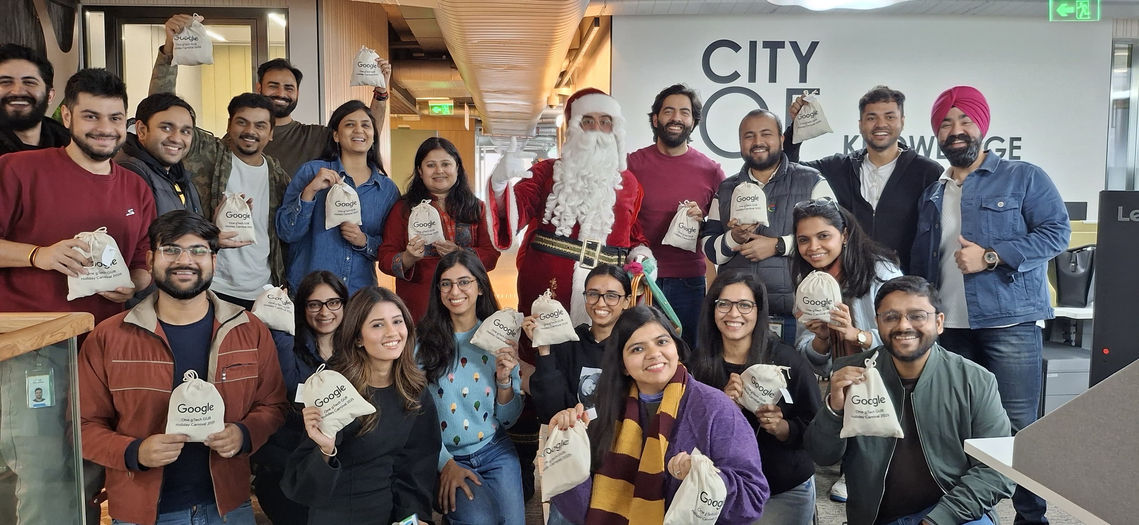 Corporate event with branded backdrop, Santa with families